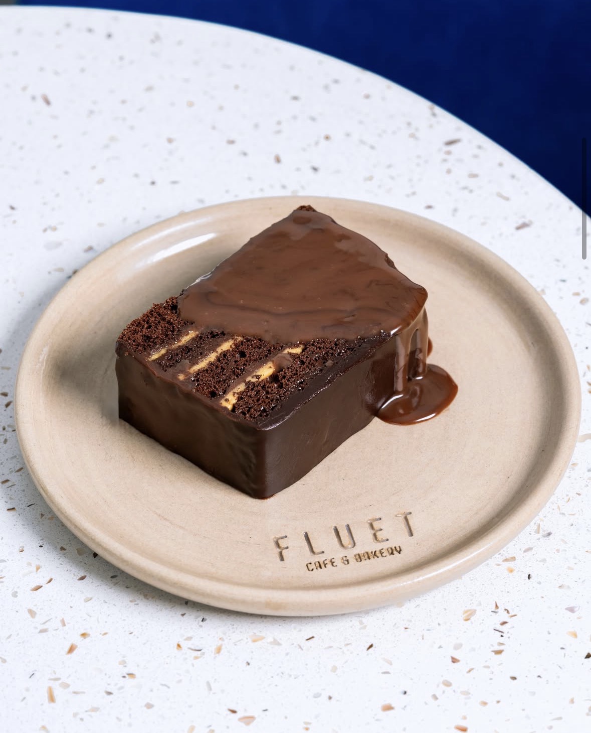 Chocolate cake on a Fluet plate